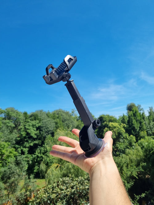 Telescopic mobile phone holder with suction base