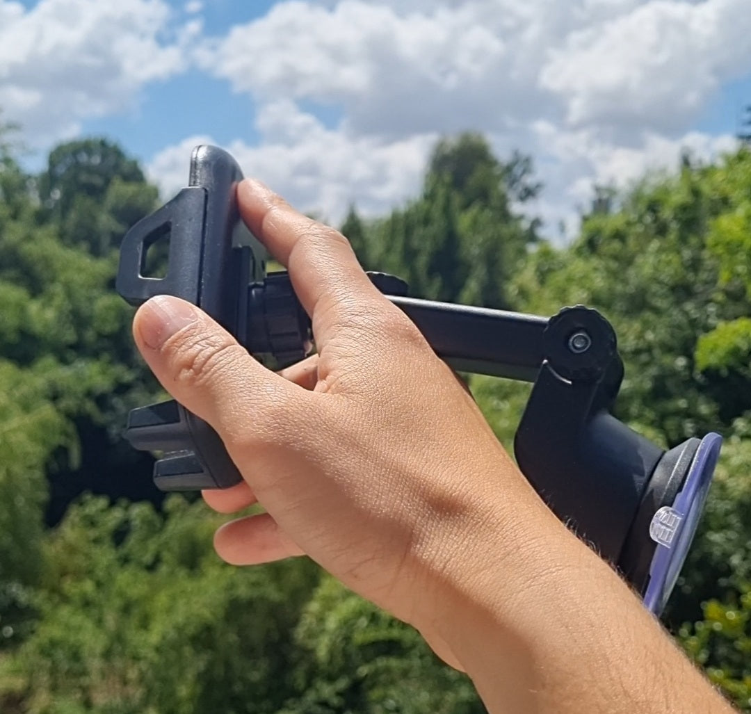 Telescopic mobile phone holder with suction base