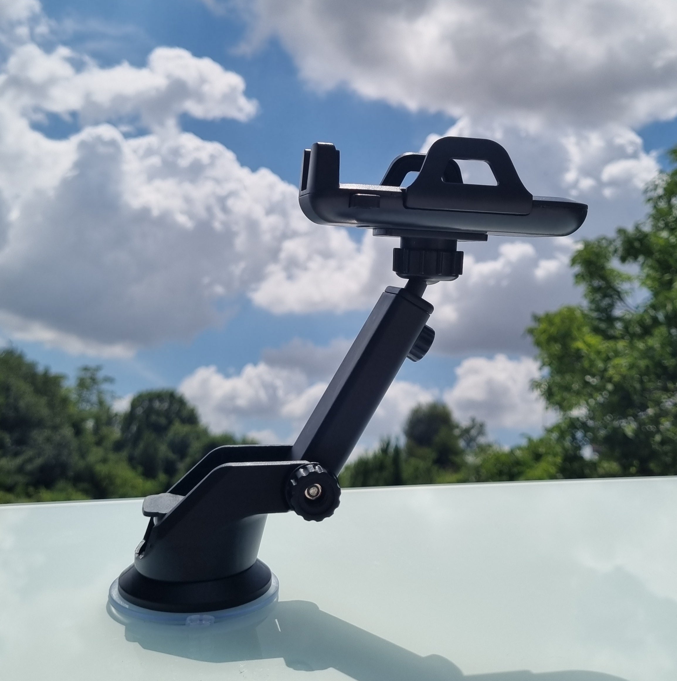 Telescopic mobile phone holder with suction base